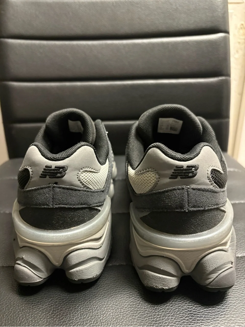 New Balance Kids Black and Gray Athletic Sneakers with Red Logo Accent
